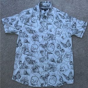 Just Attitude button up shirt skills and flowers.